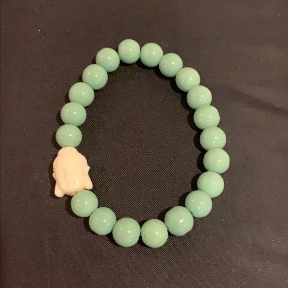 Jade colored stone bracelet w/ Buddha head